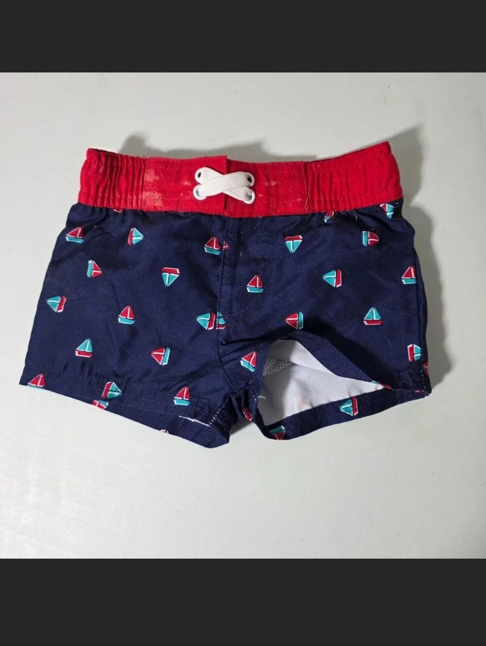 Navy Sailboat Print Toddler Swim Trunks with Red Waistband